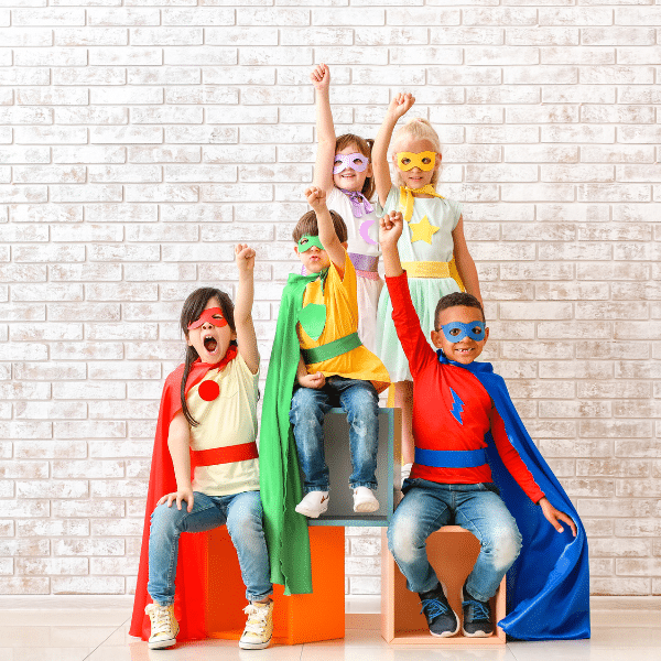 Image showing a group of kids wearing costumes posing for a photo