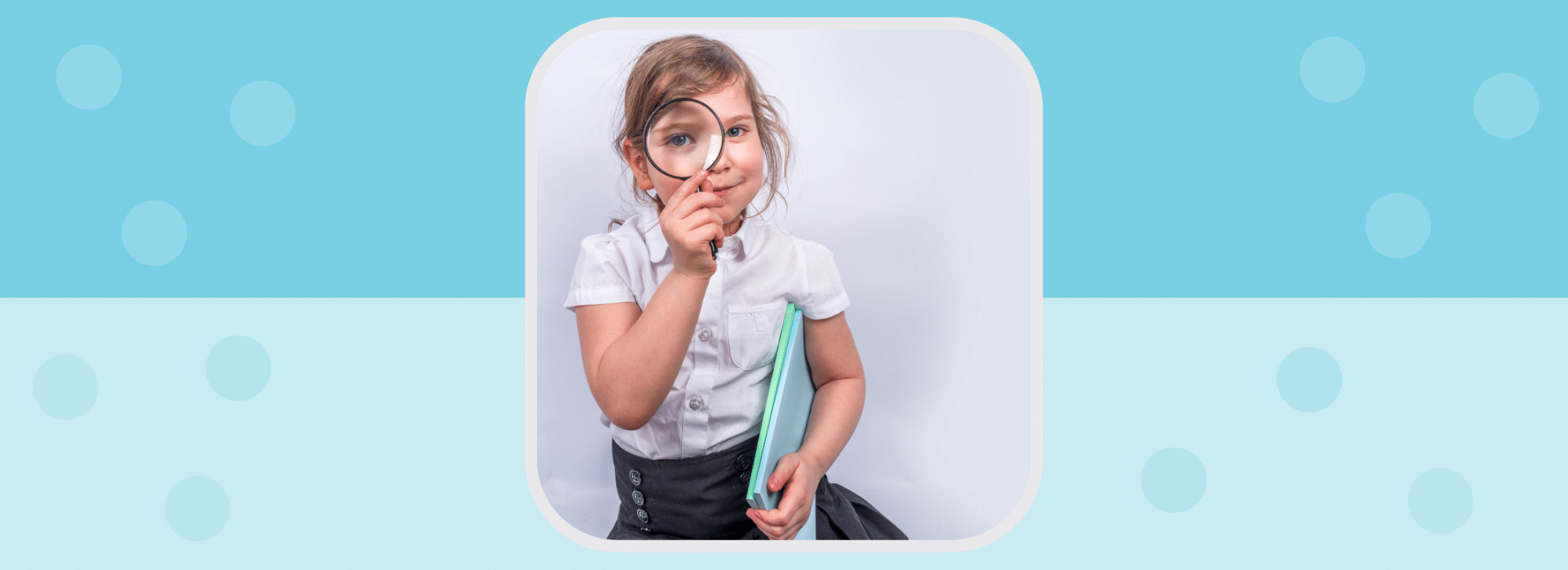 image showing a little girl holding a magnifying glass and a book